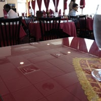Photo taken at Moghul Fine Indian Cuisine by David O. on 7/26/2012