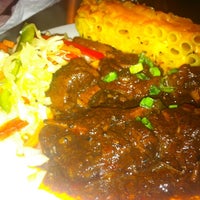 Photo taken at Janelle&amp;#39;s Caribbean American Cuisine &amp;amp; Bar by Mervin F. on 4/2/2012