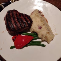 Photo taken at The Keg Steakhouse + Bar - Coquitlam by Samuel O. on 12/17/2018
