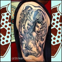 Photo taken at The Experience Ink Tattoo and Smoke Shop by Vin A. on 11/29/2012