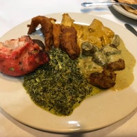 Photo taken at Mogul Indian Restaurant by Robert F. on 3/8/2018