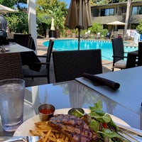Photo taken at Dinah&amp;#39;s Poolside Restaurant by Rhino on 9/10/2019