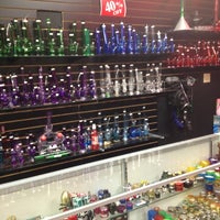 Photo taken at A dollar 9 store plus cellphone and more and smoke shop by Gladys W. on 12/19/2012