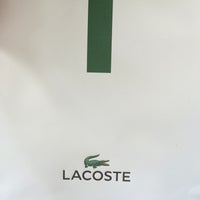 Photo taken at Lacoste by Anna B. on 8/5/2016