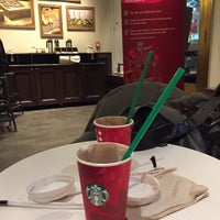 Photo taken at Starbucks by Manuel V. on 1/1/2015