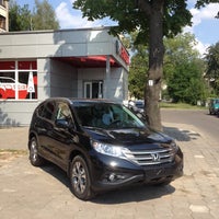 Photo taken at Фирменный центр «Honda» by Dima Y. on 8/7/2014