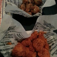 Photo taken at Wingstop by Mae F. on 1/16/2013