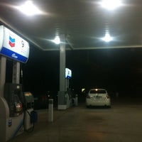 Photo taken at Chevron by L Y D I A on 12/22/2012