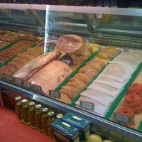 Photo taken at Graham Avenue Meats and Deli by Graham Avenue Meats and Deli on 3/7/2014