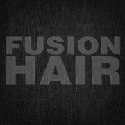 Photo taken at Fusion Salon by Fusion Salon on 3/12/2014