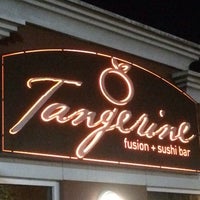Photo taken at Tangerine Fusion + Sushi Bar by Andrew M. on 3/30/2014