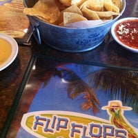 Photo taken at Flip Flops Cantina Grille by Steph on 12/17/2012