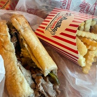 Photo taken at Portillo&amp;#39;s Hot Dogs by Rica T. on 7/8/2022