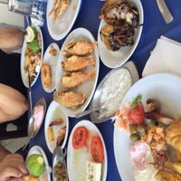 Photo taken at Zephyros Fish Tavern by Ozhan O. on 10/18/2015