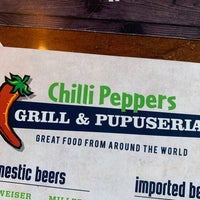 Photo taken at Chilli Peppers Coastal Grill by Andy F. on 12/11/2020