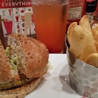 Photo taken at Red Robin Gourmet Burgers and Brews by christeeene on 4/4/2015