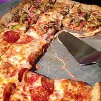 Photo taken at Jim&amp;#39;s Razorback Pizza by Marcia D. on 4/27/2013