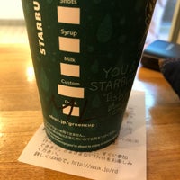 Photo taken at Starbucks by Hirotaka I. on 3/24/2018