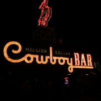 Photo taken at Million Dollar Cowboy Bar by Christina L. on 2/23/2015