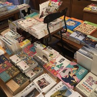 Photo taken at 旅の本屋 のまど by Sq P. on 5/4/2018