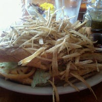 Photo taken at Gusto Cuban Cafe by Jennifer W. on 10/13/2012