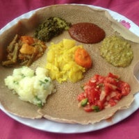 Photo taken at Meskerem Ethiopian Restaurant by Sir Apollo T. on 3/21/2013