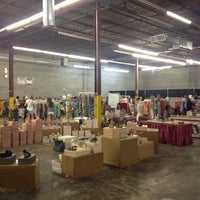 Photo taken at Boutique Warehouse Sale by Stephanie B. on 7/20/2013