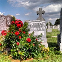Photo taken at New Calvary Cemetery by Kris R. on 7/26/2013