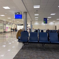 Photo taken at Gate T14 by Gene X. on 12/30/2019