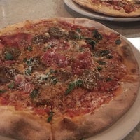 Photo taken at Brixx Wood Fired Pizza by Denzell S. on 3/9/2018