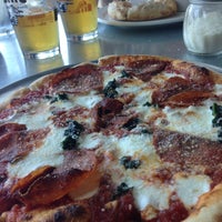 Photo taken at SoBro Pizza Co by Enrique C. on 7/6/2014