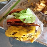 Photo taken at BurgerFi by Kanya J. on 5/10/2013