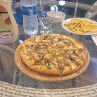 Photo taken at Pizza Land by ..”ozan.. .. on 5/20/2014