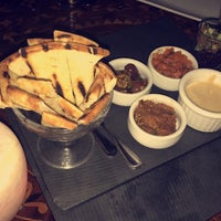 Photo taken at Tagine Beverly Hills by Rima S. on 4/26/2018