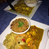 Photo taken at Reef Caribbean Restaurant And Lounge by Keeks B. on 5/26/2015