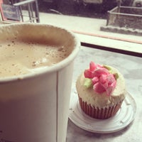 Photo taken at Cupcake Cafe by honeywhatscooking.com on 4/2/2015