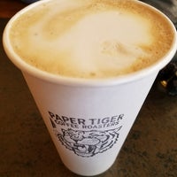 Photo taken at Paper Tiger Coffee Roasters by Austin G. on 7/27/2017