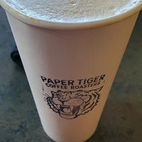 Photo taken at Paper Tiger Coffee Roasters by Austin G. on 9/15/2020