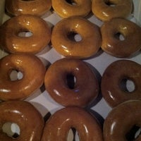 Photo taken at Krispy Kreme Doughnuts by THERESA S. on 10/20/2012