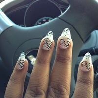 Photo taken at Queen Nails by Enjanae P. on 12/28/2012