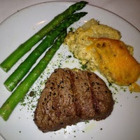 Photo taken at Fleming&amp;#39;s Prime Steakhouse &amp;amp; Wine Bar by Miriam D. on 12/27/2012