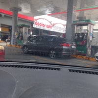 Photo taken at Gasolinera calle 10 by Dave O. on 9/6/2016