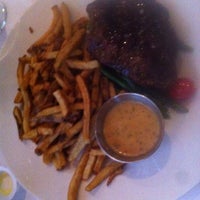 Photo taken at Steak Frites St-Paul by Beatrice S. on 5/10/2014