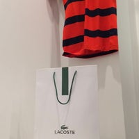 Photo taken at Lacoste by Julien O. on 5/12/2014