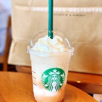 Photo taken at Starbucks by に on 8/5/2021