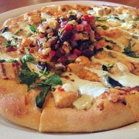 Photo taken at California Pizza Kitchen by Johnny L. on 3/21/2013