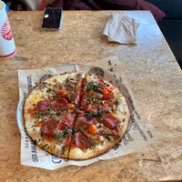 Photo taken at PizzaRev by robert l. on 12/29/2019