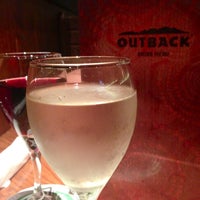 Photo taken at Outback Steakhouse by Nicole G. on 4/11/2013