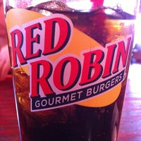 Photo taken at Red Robin Gourmet Burgers and Brews by Erin H. on 12/29/2012