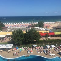 Photo taken at Sunny Beach by Ayhan Calıskan on 7/8/2016